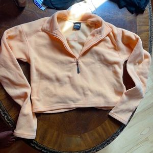 Orange cropped north face